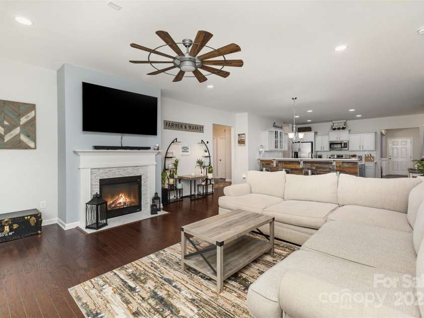 6007 Eleanor Rigby Road, Charlotte, NC 28278.  MLS# CAR4268118, YatesRealty ID 21354. Marble tile fireplace in living room