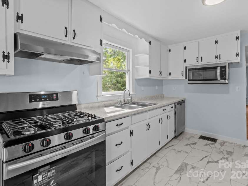 310 Spencer Avenue, Spencer, NC 28159.  MLS# CAR4264159, YatesRealty ID 21358. 