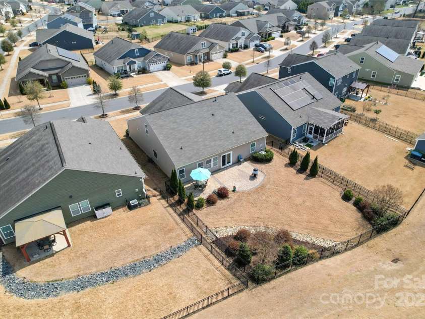 11124 Chapeclane Road, Charlotte, NC 28278.  MLS# CAR4233516, YatesRealty ID 21362. Birdseye view of the fenced backyard and landscaping. Brick Paver Patio!! Room for a Pool!