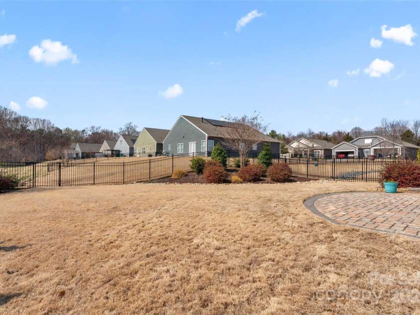 11124 Chapeclane Road, Charlotte, NC 28278.  MLS# CAR4233516, YatesRealty ID 21362. Full views of rolling hills onto the green common area