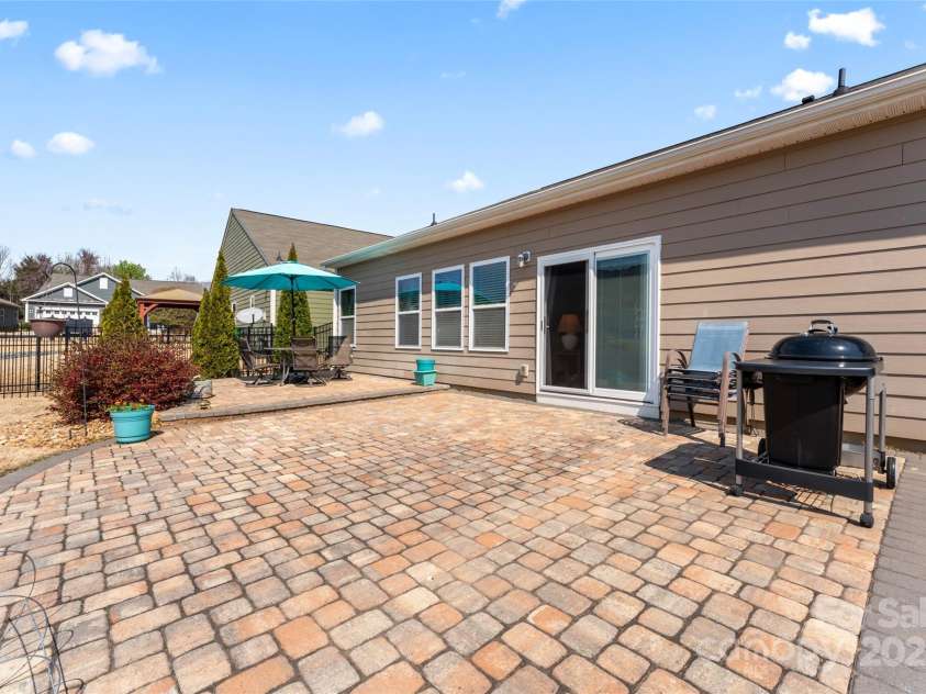 11124 Chapeclane Road, Charlotte, NC 28278.  MLS# CAR4233516, YatesRealty ID 21362. Stone pavers create an oasis for relaxing