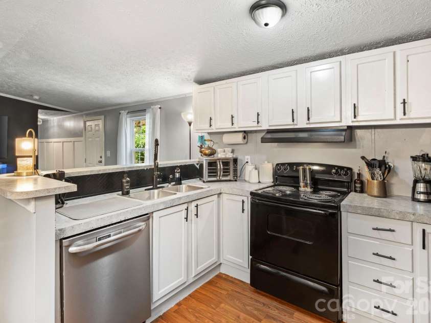 23 Lela Lane, Alexander, NC 28701.  MLS# CAR4378997, YatesRealty ID 21362. 