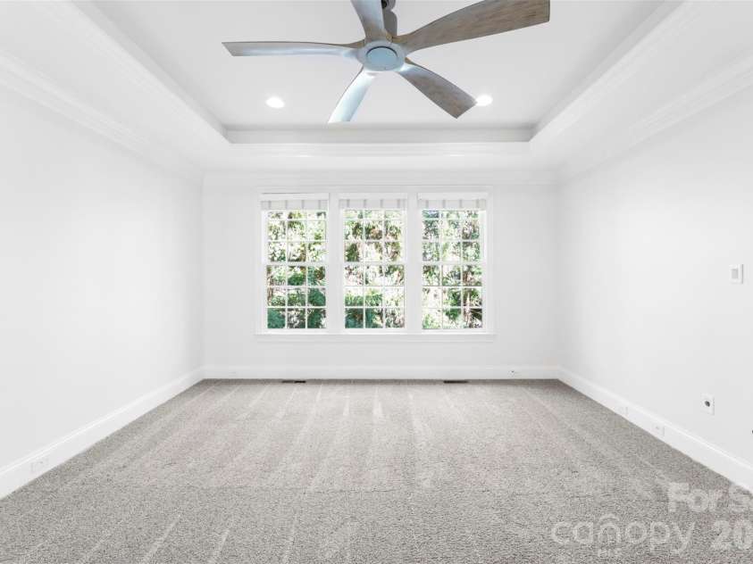 8928 Heydon Hall Circle, Charlotte, NC 28210.  MLS# CAR4297775, YatesRealty ID 21363. First floor primary bedroom located on backside of the home