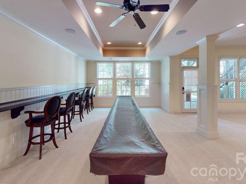 8928 Heydon Hall Circle, Charlotte, NC 28210.  MLS# CAR4297775, YatesRealty ID 21363. Fully finished basement with full bath, bedroom, access to outside patio.