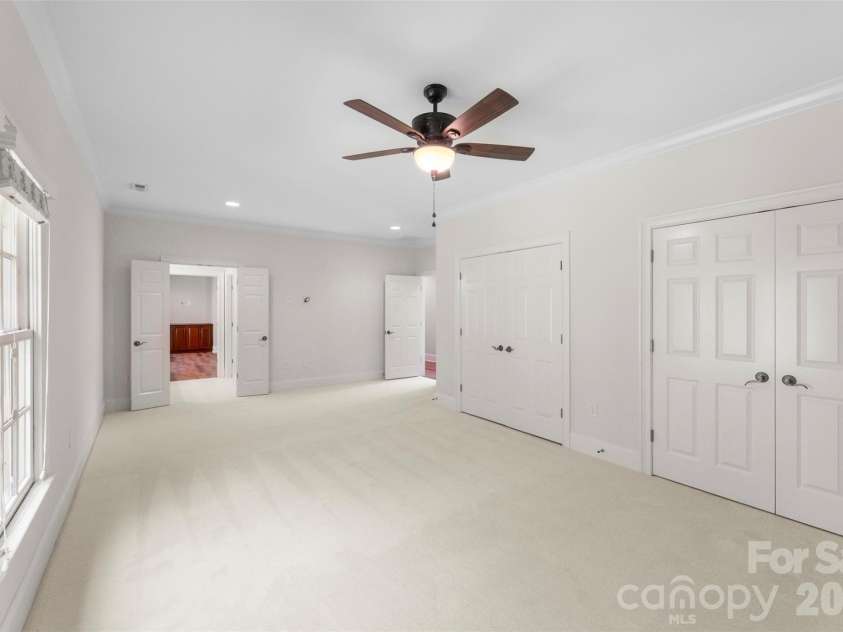 8928 Heydon Hall Circle, Charlotte, NC 28210.  MLS# CAR4297775, YatesRealty ID 21363. Large bedroom connected to full bath and access to Media Room 