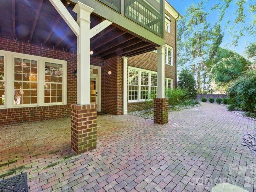 8928 Heydon Hall Circle, Charlotte, NC 28210.  MLS# CAR4297775, YatesRealty ID 21363. Walkout from basement onto the brick patio