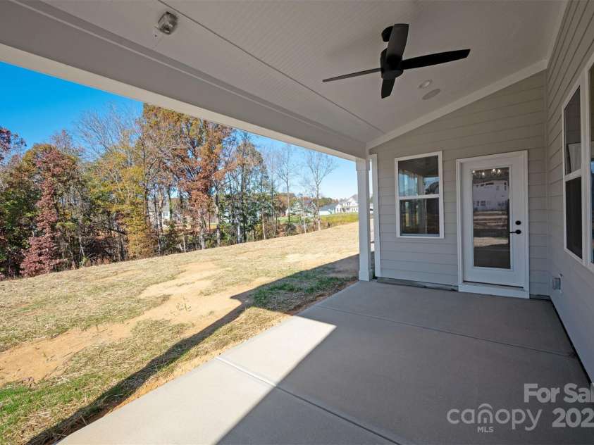 11009 Tyler Brook Lane, Mint Hill, NC 28227.  MLS# CAR4267005, YatesRealty ID 21366. Rear Covered Patio