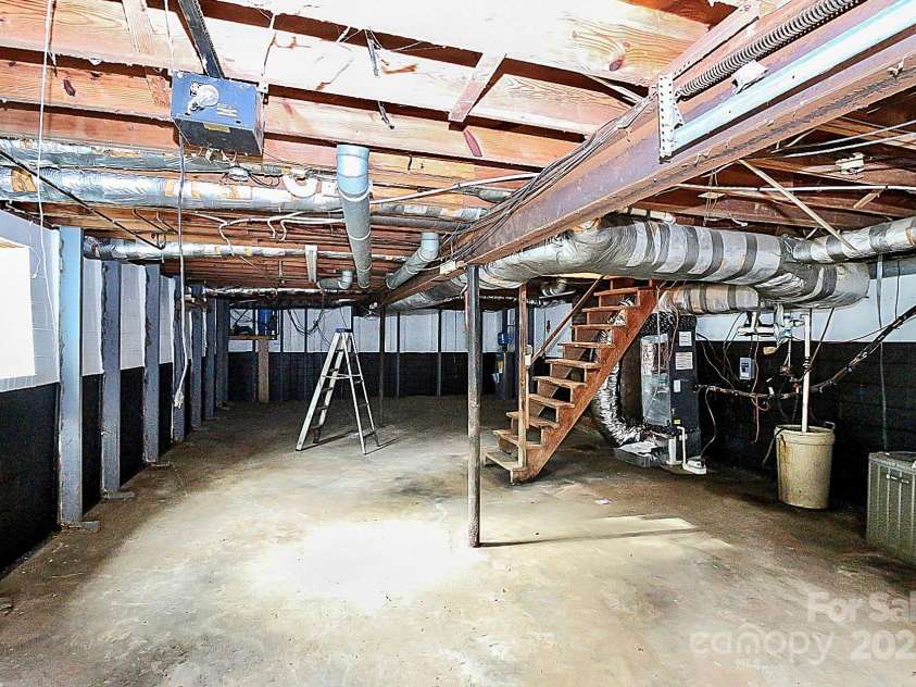 7047 Cheyenne Drive, Charlotte, NC 28262.  MLS# CAR4305493, YatesRealty ID 2137. Unfinished basement