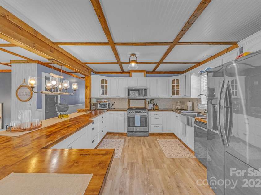 1 Plaza Drive, Granite Falls, NC 28630.  MLS# CAR4263385, YatesRealty ID 21372. Spacious kitchen