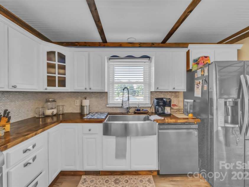 1 Plaza Drive, Granite Falls, NC 28630.  MLS# CAR4263385, YatesRealty ID 21372. Window by the sink overlooks the Pool area