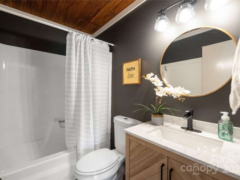 4115 Conley Street, Newton, NC 28658.  MLS# CAR4247825, YatesRealty ID 21374. Hall Bathroom