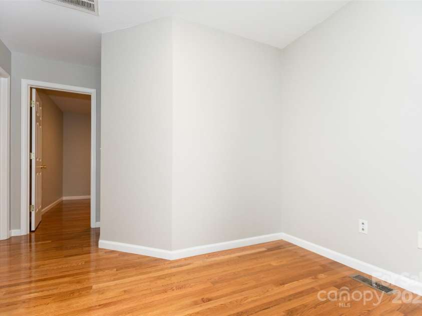 13 Castle Street, Asheville, NC 28803.  MLS# CAR4278006, YatesRealty ID 2138. Hallway to Third Bedroom