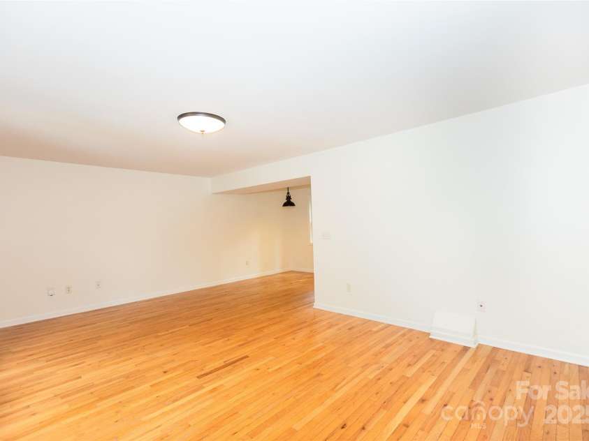 13 Castle Street, Asheville, NC 28803.  MLS# CAR4278006, YatesRealty ID 2138. Living Room and Dining Area