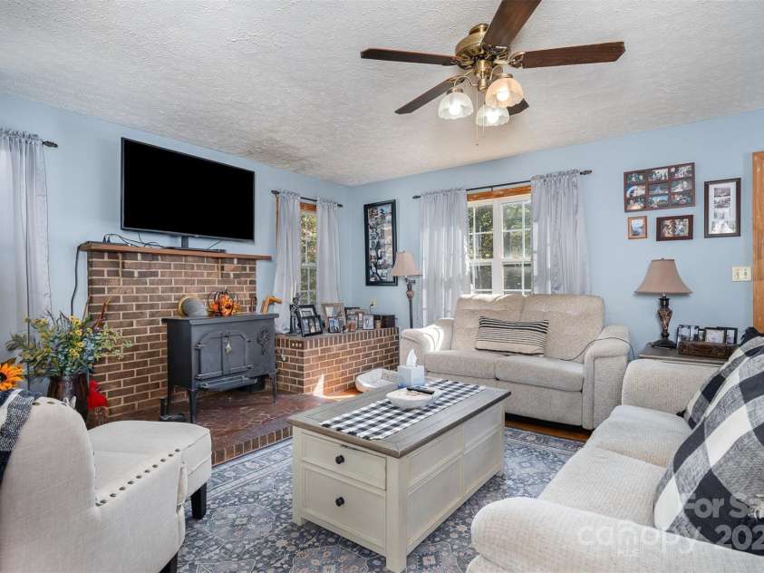 3220 Sawmill Road, Hickory Grove, SC 29717.  MLS# CAR4119221, YatesRealty ID 2138. Livingroom w/ Fireplace