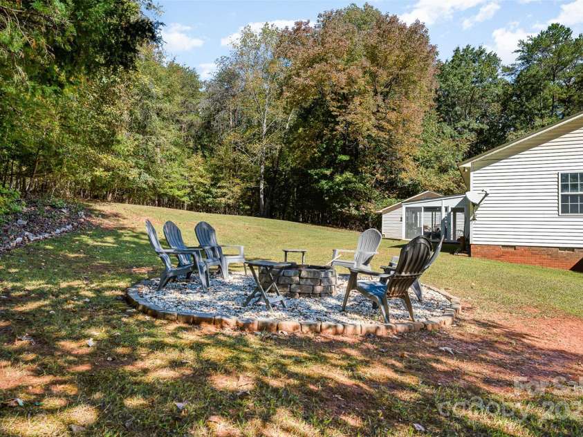3220 Sawmill Road, Hickory Grove, SC 29717.  MLS# CAR4119221, YatesRealty ID 2138. Side-Back View w/ Fire Pit
