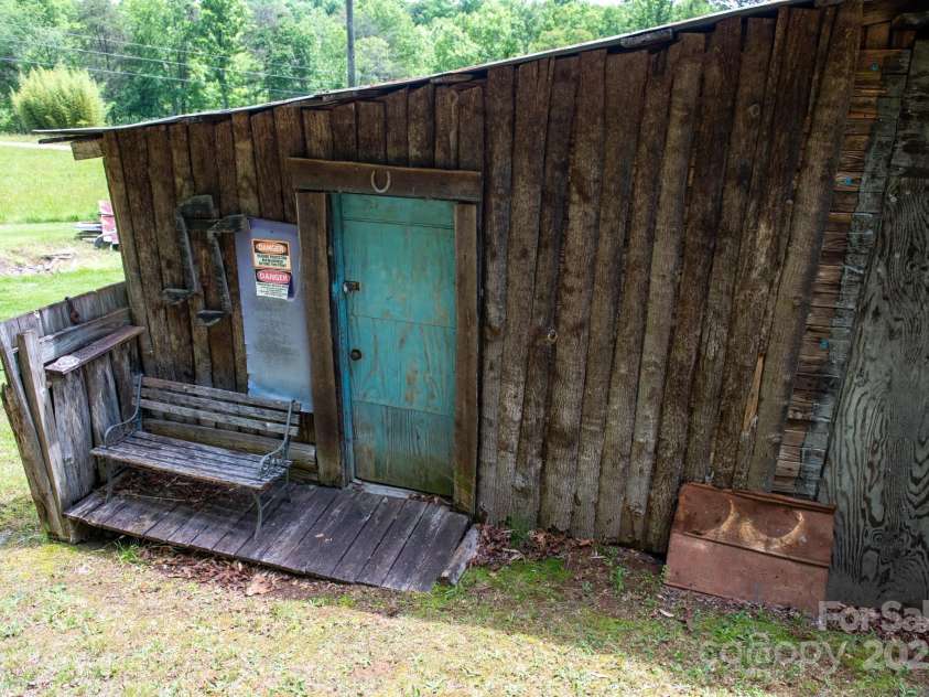 2023 White Springs Lane, Lenoir, NC 28645.  MLS# CAR4266812, YatesRealty ID 21383. Storage building