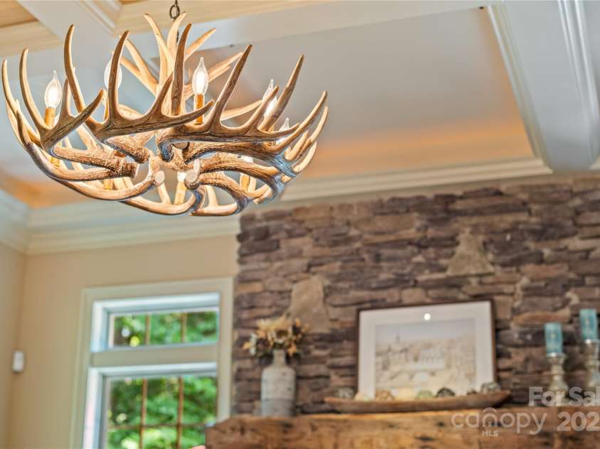 14130 Lea Point Court, Huntersville, NC 28078.  MLS# CAR4247240, YatesRealty ID 21385. Beautiful antler chandelier adds to the mountain vibe of this home.