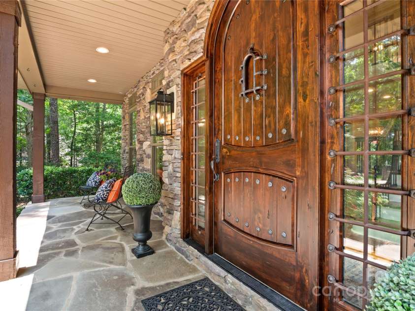 14130 Lea Point Court, Huntersville, NC 28078.  MLS# CAR4247240, YatesRealty ID 21385. Covered front porch with amazing mahogany front door that has just been lovingly refinished.