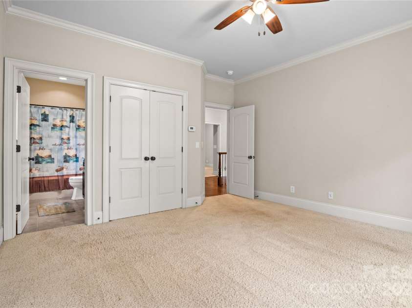 14130 Lea Point Court, Huntersville, NC 28078.  MLS# CAR4247240, YatesRealty ID 21385. Front bedroom 3 with a private on-suite bathroom