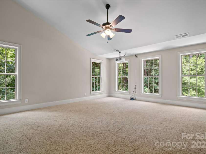 14130 Lea Point Court, Huntersville, NC 28078.  MLS# CAR4247240, YatesRealty ID 21385. Huge bonus room with 2 TV's and projector that stay with the home.