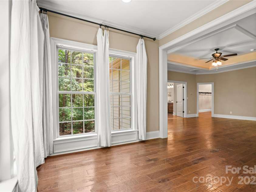 14130 Lea Point Court, Huntersville, NC 28078.  MLS# CAR4247240, YatesRealty ID 21385. Sitting area off the primary bedroom. There are winter water views from here!