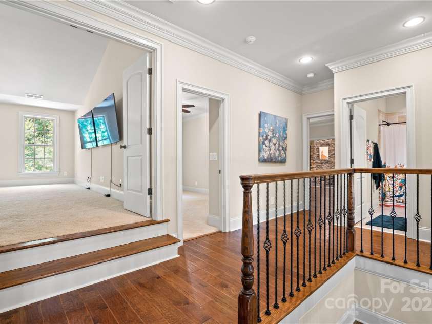 14130 Lea Point Court, Huntersville, NC 28078.  MLS# CAR4247240, YatesRealty ID 21385. The wood upstairs was only added a few years ago. Notice all the heavy molding upstairs too!