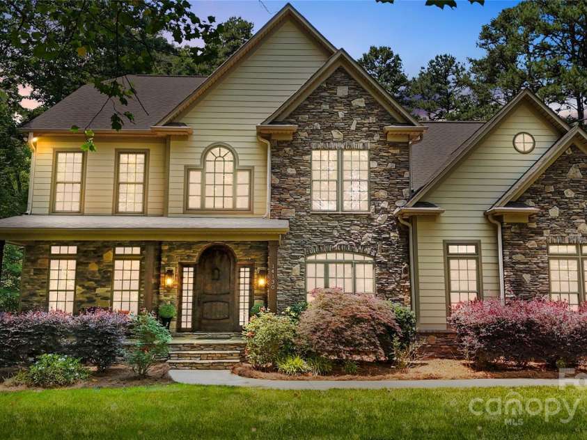 14130 Lea Point Court, Huntersville, NC 28078.  MLS# CAR4247240, YatesRealty ID 21385. This 2006 Custom homes has beautiful mature landscaping & lots of privacy.