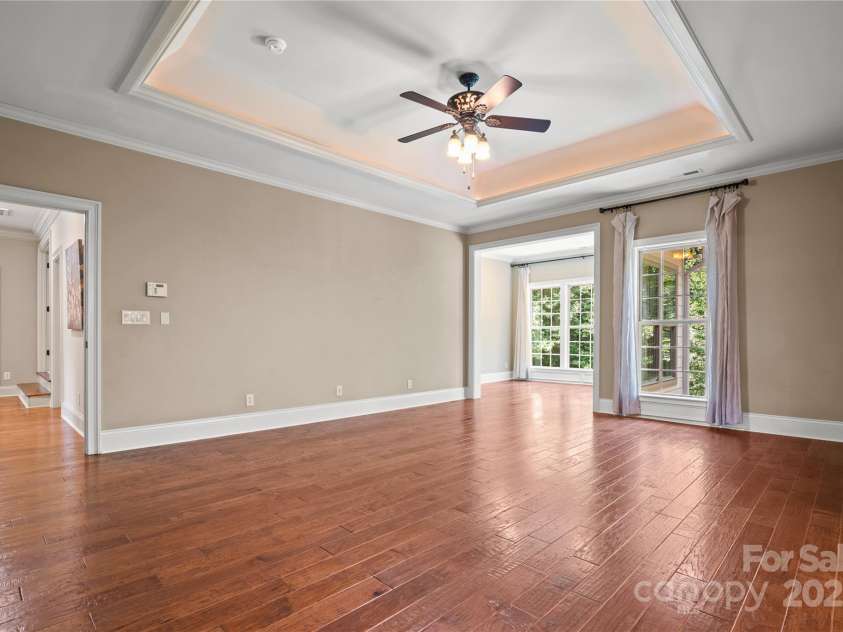 14130 Lea Point Court, Huntersville, NC 28078.  MLS# CAR4247240, YatesRealty ID 21385. View of the primary bedroom from the walk in closet.