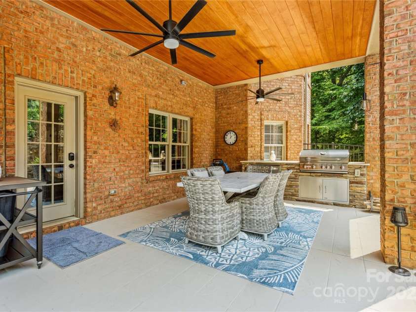 183 April Road, Troutman, NC 28166.  MLS# CAR4158487, YatesRealty ID 2139. Covered Terrace with outdoor Grilling Kitchen