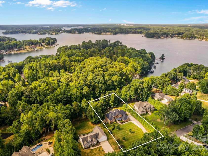 183 April Road, Troutman, NC 28166.  MLS# CAR4158487, YatesRealty ID 2139. Enclave of Waterfront Homes in Hawkes Bay