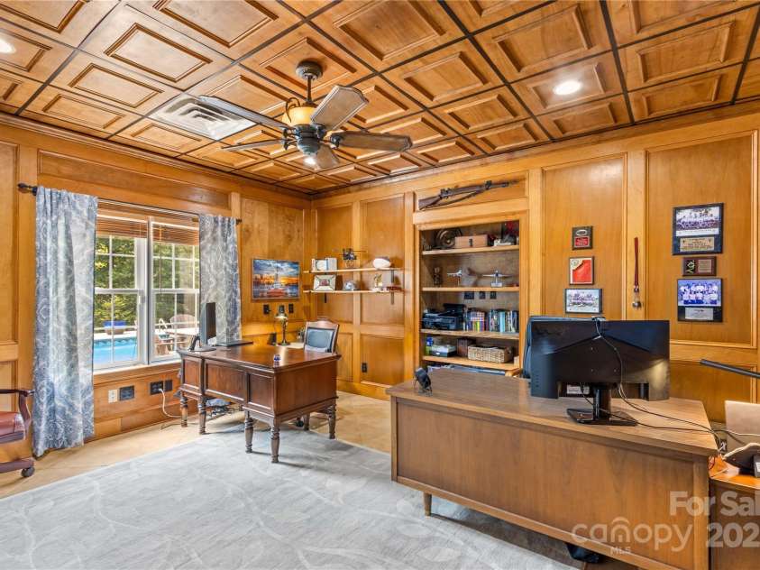 183 April Road, Troutman, NC 28166.  MLS# CAR4158487, YatesRealty ID 2139. Executive Office, with a view of the Pool