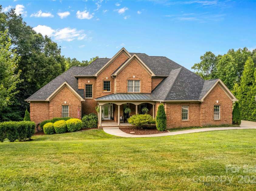 183 April Road, Troutman, NC 28166.  MLS# CAR4158487, YatesRealty ID 2139. Front of 183 April Lane