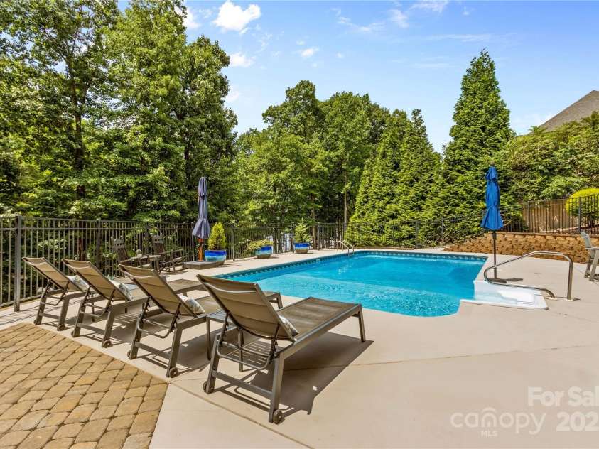 183 April Road, Troutman, NC 28166.  MLS# CAR4158487, YatesRealty ID 2139. Lounge beside the Pool