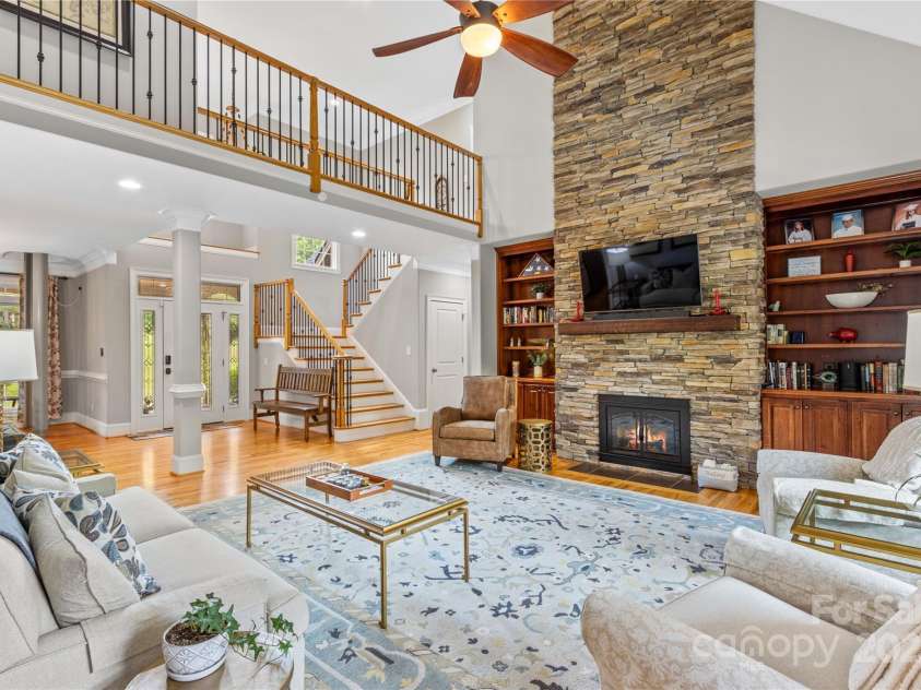 183 April Road, Troutman, NC 28166.  MLS# CAR4158487, YatesRealty ID 2139. Stone Fireplace and Built In Shelving
