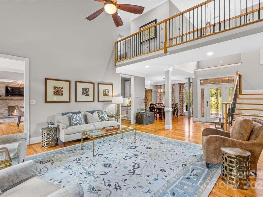 183 April Road, Troutman, NC 28166.  MLS# CAR4158487, YatesRealty ID 2139. Upstairs hallway overlooks the Great Room