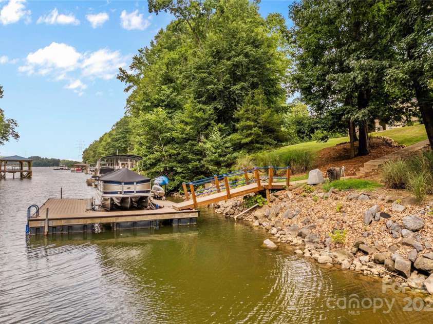 183 April Road, Troutman, NC 28166.  MLS# CAR4158487, YatesRealty ID 2139. Waterfront with Pier, Boat Slip & Boat Lift