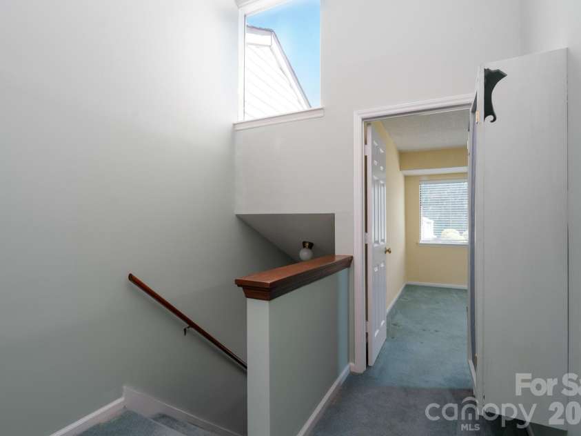 10969 Carmel Crossing Road, Charlotte, NC 28226.  MLS# CAR4378876, YatesRealty ID 21391. Upstairs Hall