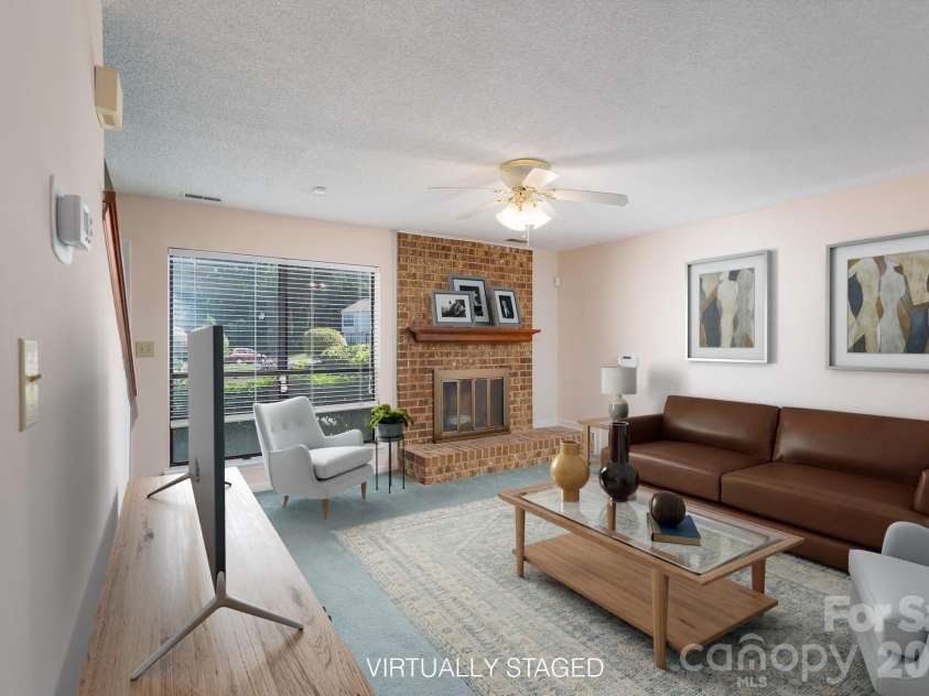 10969 Carmel Crossing Road, Charlotte, NC 28226.  MLS# CAR4378876, YatesRealty ID 21391. Virtually Staged Living Room