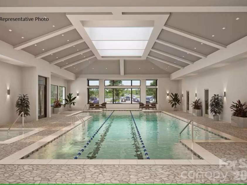 2730 Peak Court, Belmont, NC 28012.  MLS# CAR4381647, YatesRealty ID 21392. Luxurious indoor heated lap pool and spa