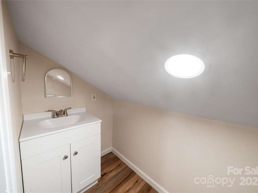 105 Bluebell Ridge Lane, Weaverville, NC 28787.  MLS# CAR4303351, YatesRealty ID 21393. Bonus room has extra half bath. (Not counted in square footage)