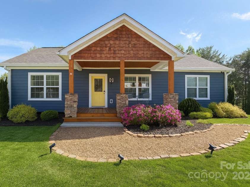 105 Bluebell Ridge Lane, Weaverville, NC 28787.  MLS# CAR4303351, YatesRealty ID 21393. Charming Cottage Style Home with Year Round Views.