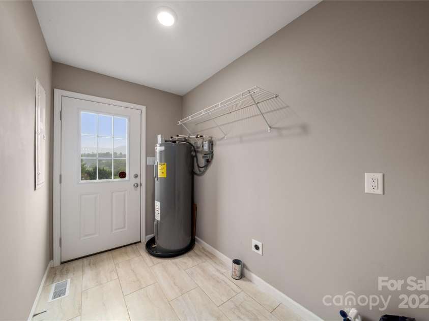 105 Bluebell Ridge Lane, Weaverville, NC 28787.  MLS# CAR4303351, YatesRealty ID 21393. Even the main level laundry room has views.