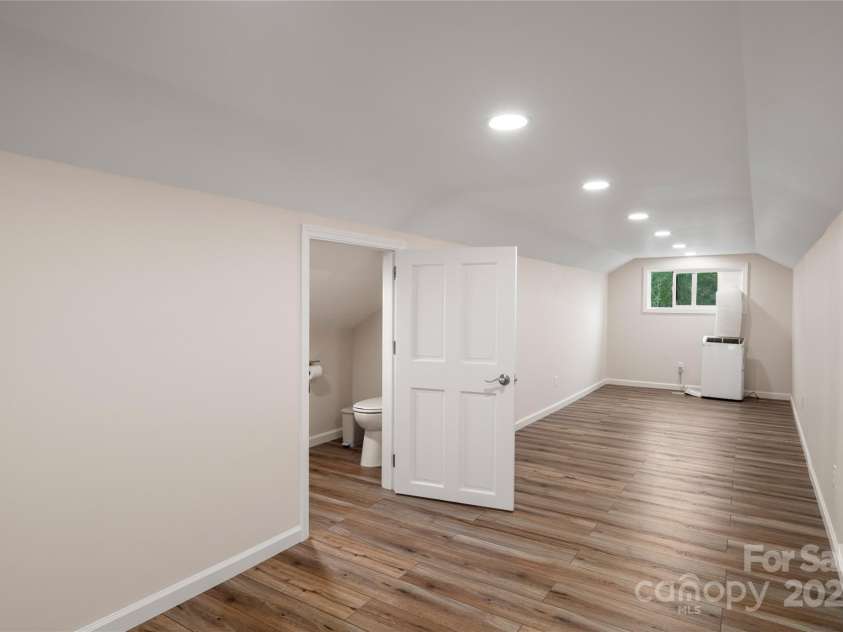 105 Bluebell Ridge Lane, Weaverville, NC 28787.  MLS# CAR4303351, YatesRealty ID 21393. Flexible upper space is perfect for office, playroom, art studio, etc.