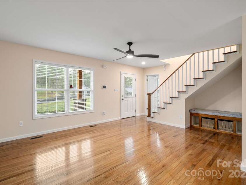 105 Bluebell Ridge Lane, Weaverville, NC 28787.  MLS# CAR4303351, YatesRealty ID 21393. Main living area, natural light filled, hardwood floors