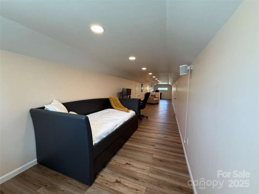 105 Bluebell Ridge Lane, Weaverville, NC 28787.  MLS# CAR4303351, YatesRealty ID 21393. Upper bonus room set up as guest room w/ office