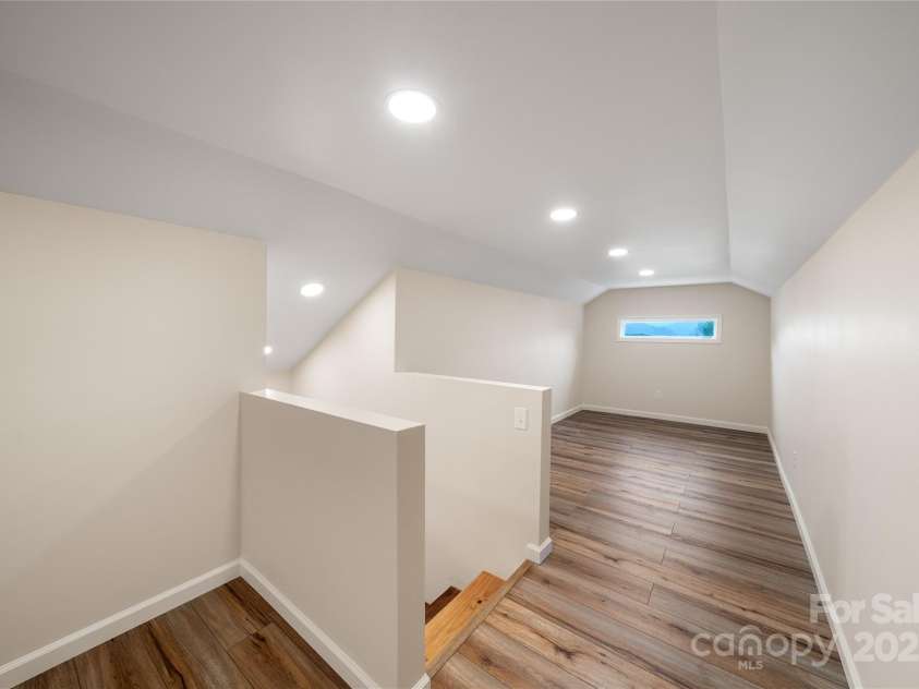 105 Bluebell Ridge Lane, Weaverville, NC 28787.  MLS# CAR4303351, YatesRealty ID 21393. Upper level offers a 350 square foot bonus room with additional 1/2 bath (upper not counted in square footage).