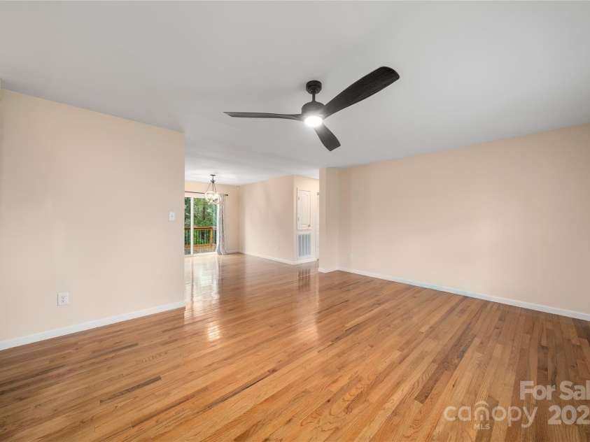 105 Bluebell Ridge Lane, Weaverville, NC 28787.  MLS# CAR4303351, YatesRealty ID 21393. Virtually staged living, dining area