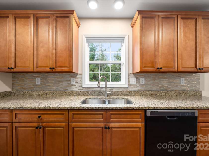 105 Bluebell Ridge Lane, Weaverville, NC 28787.  MLS# CAR4303351, YatesRealty ID 21393. Window above sink overlooking backyard view