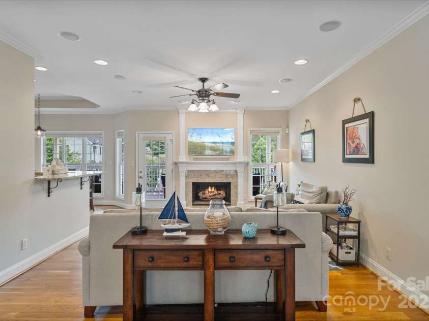 7471 Barfield Lane, Denver, NC 28037.  MLS# CAR4250519, YatesRealty ID 21396. Cozy living room with fireplace!