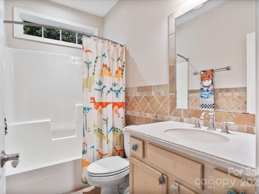 7471 Barfield Lane, Denver, NC 28037.  MLS# CAR4250519, YatesRealty ID 21396. Full main level bathroom